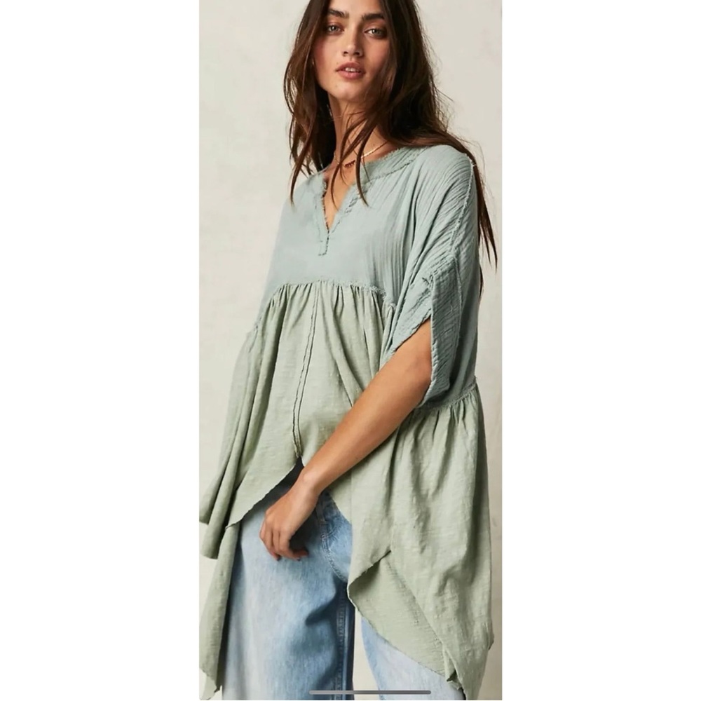 Free people 
Gauze blouse 
Retails for $88